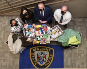 State Parole Board Staff Collect Winter Coats and Food for Trenton Area Communities